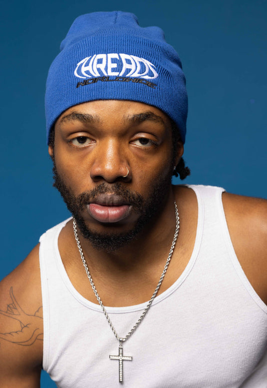 Uncommon Worldwide Blue Beanie